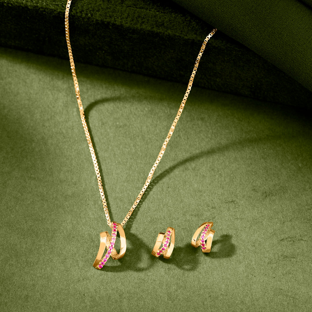 sweeping magenta gold necklace set