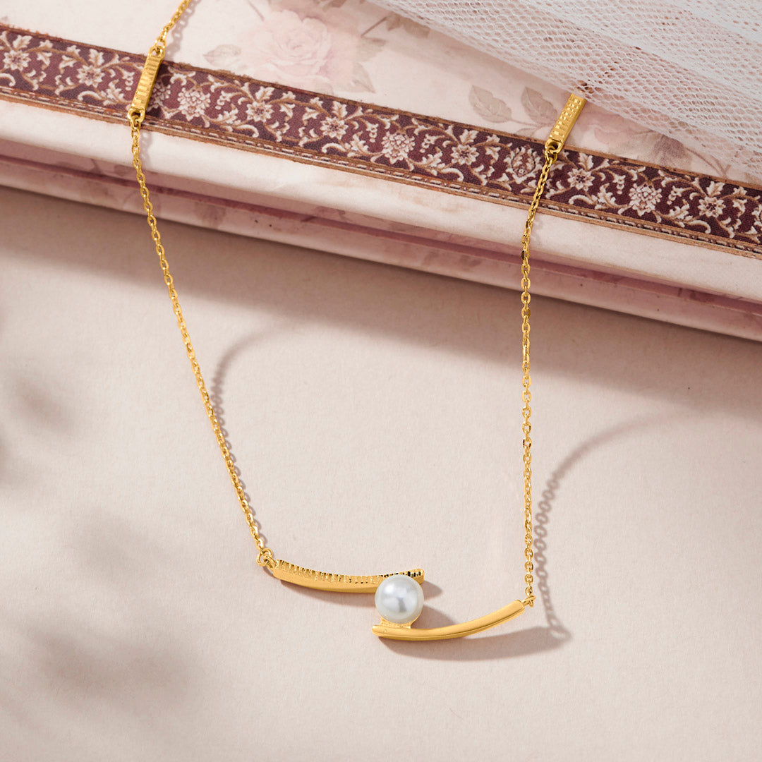 golden swoop modern gold necklace