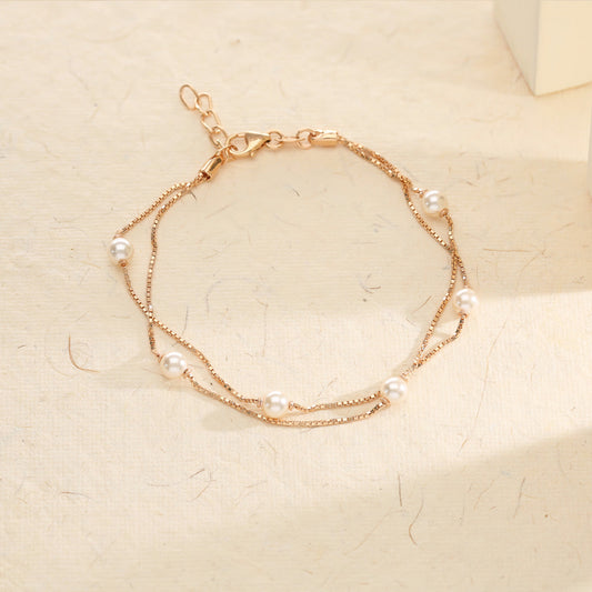 Orbital Pearl Glow Flexible Gold Bracelet