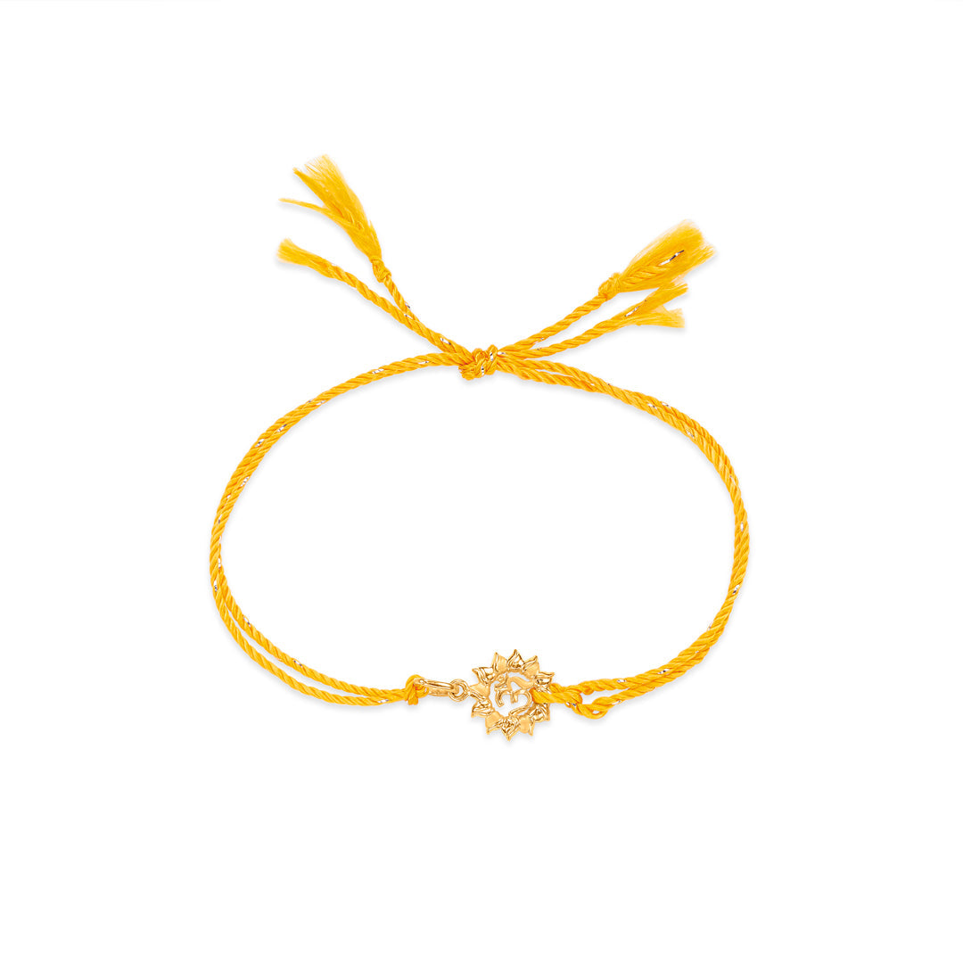 Radiant Om Gold Rakhi