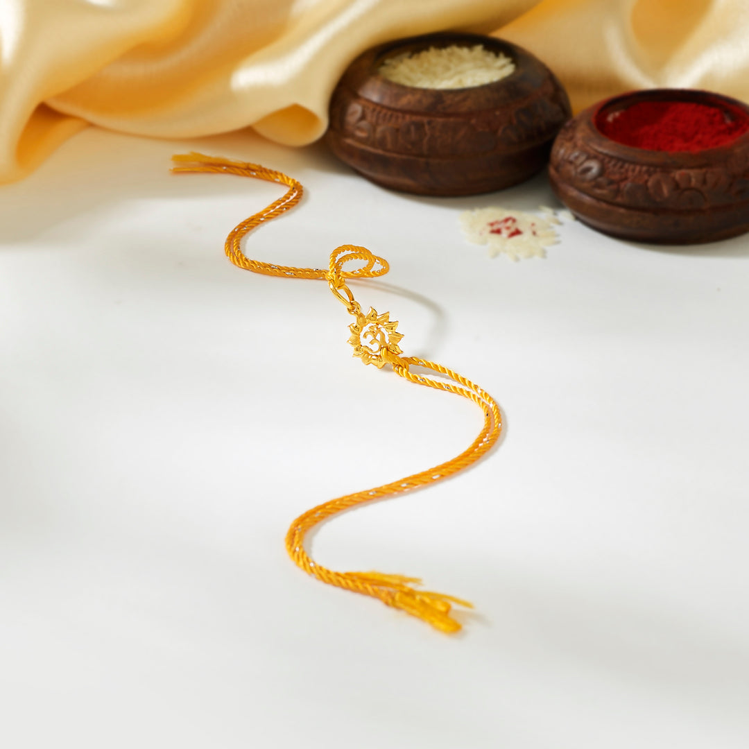 Radiant Om Gold Rakhi