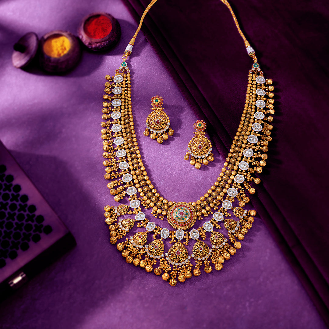 Rajnita Pratha Gold Necklace Set