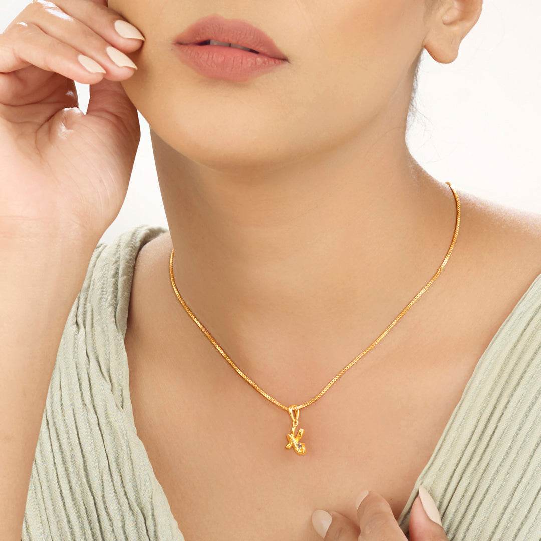 k essence gold pendant