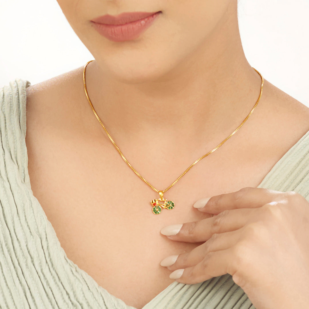 golden ride gold pendant