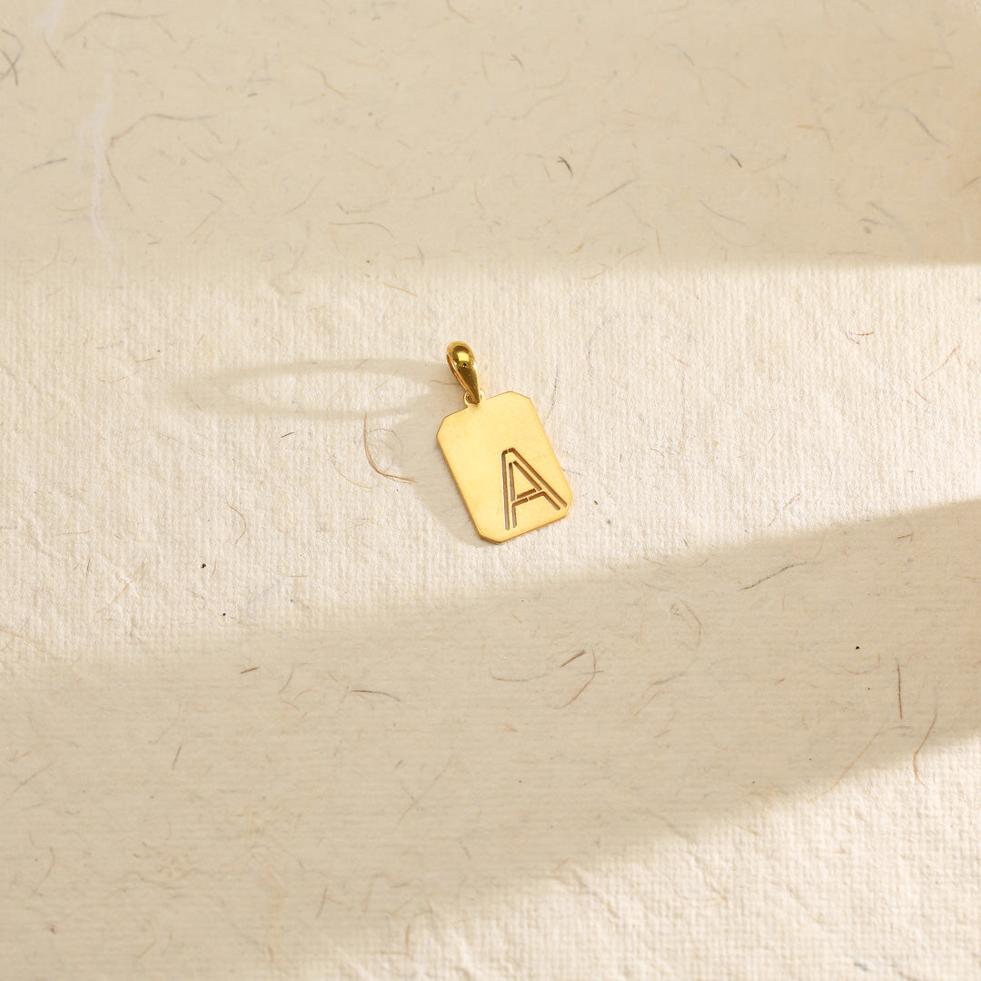 adorned a alphabet  gold pendant