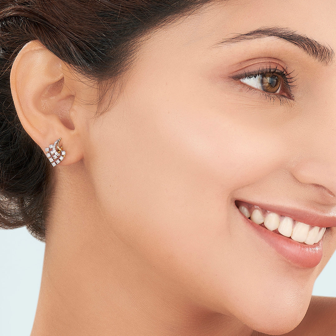 starburst twist yellow gold stud diamond earring for women