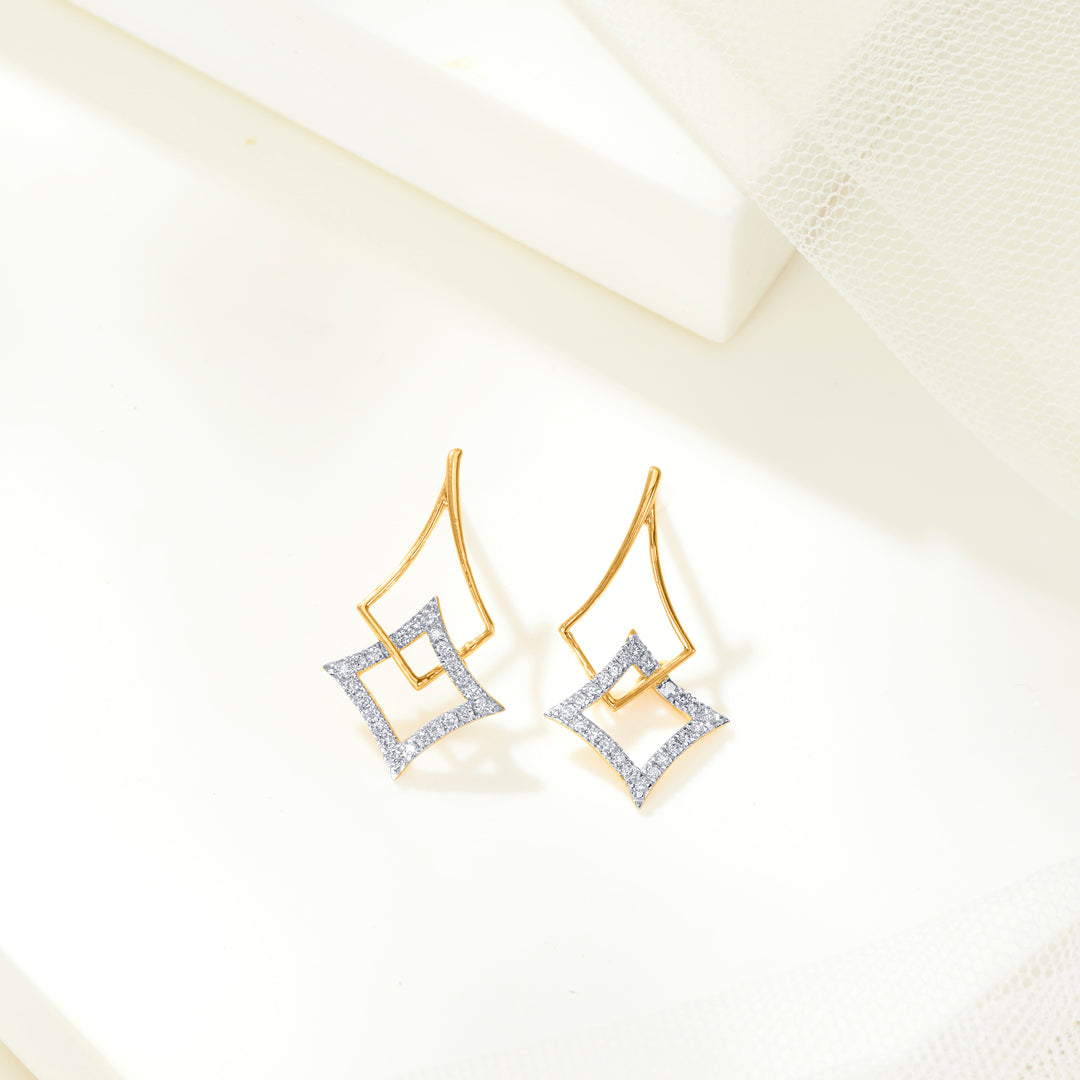 imperial glide gold dangler earring for woman