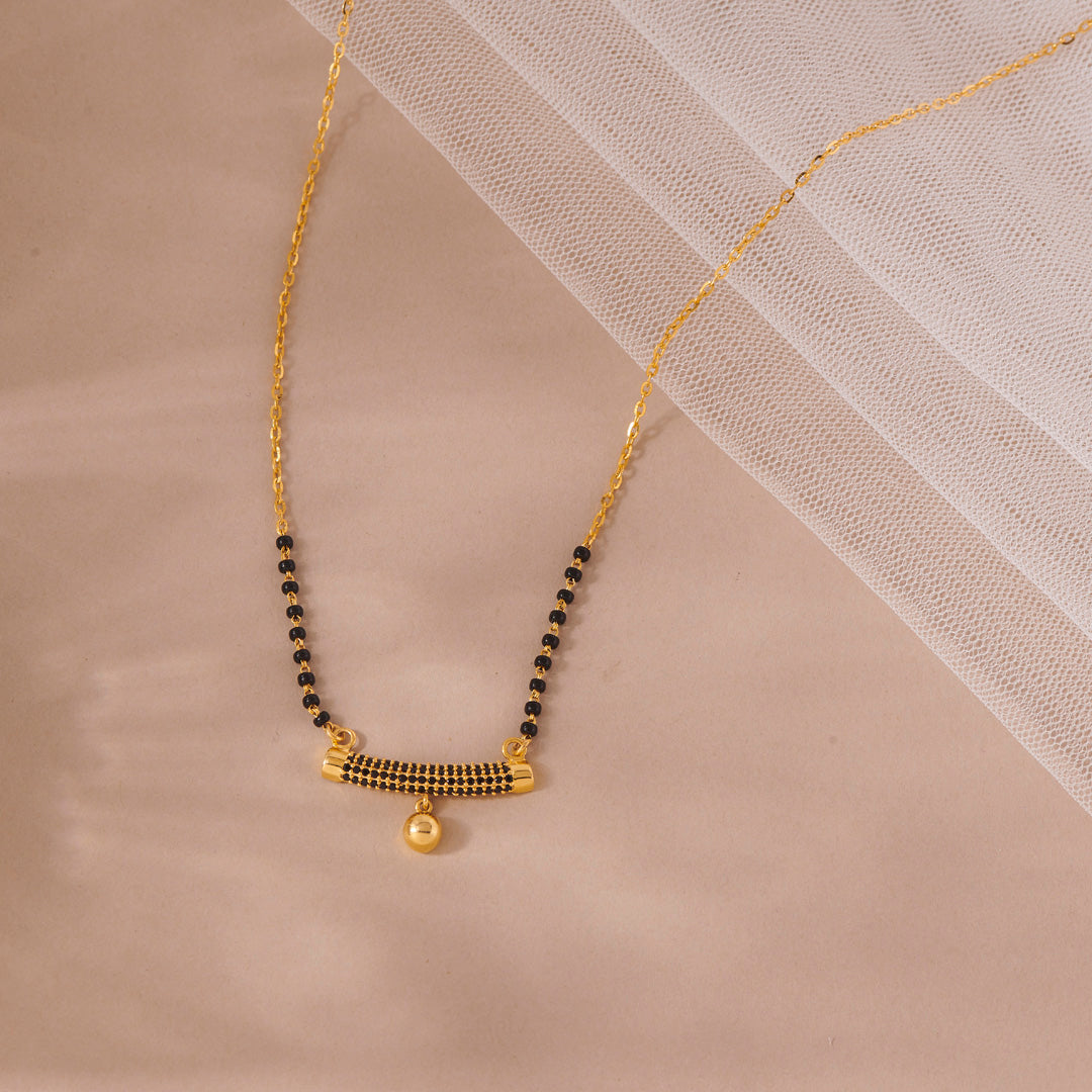 Held as One Gold Mangalsutra for Her