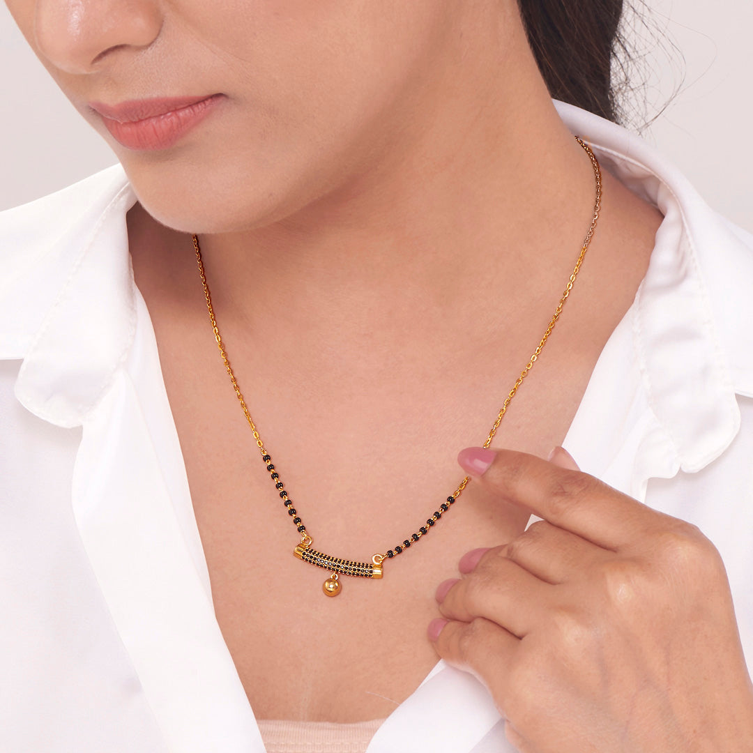 Held as One Gold Mangalsutra for Her