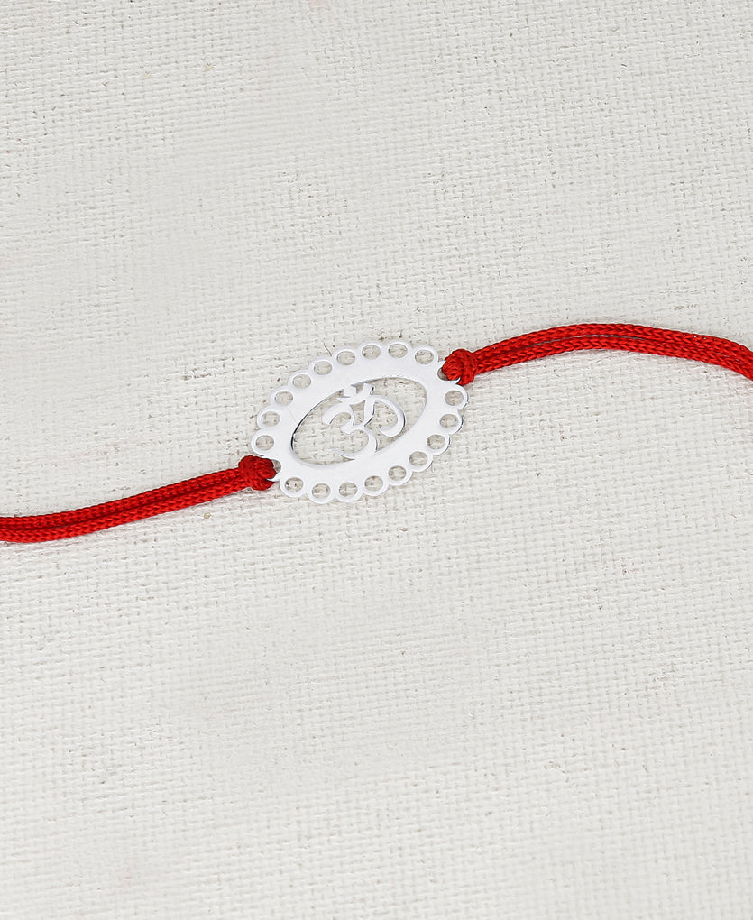 Devotee Om Silver Rakhi Bracelet