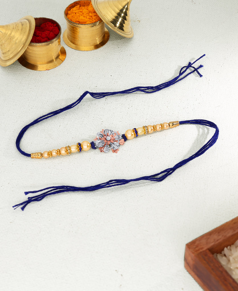 Floral Silver Rakhi Bracelet Blue